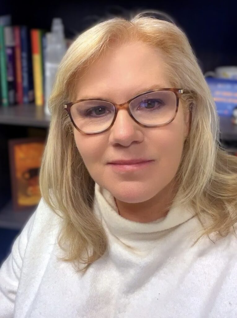 Dr. Lauree Brown portrait showcasing writer and scholar focused on women’s voices and academic research